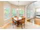 Bright dining area with large windows and tile floors at 132 Homeplace Ln, Statesville, NC 28625