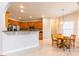 Open kitchen and breakfast nook with tile floors, oak cabinets, and stainless steel appliances at 132 Homeplace Ln, Statesville, NC 28625
