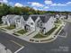 Aerial view of townhome community showcasing modern architecture and street layout at 149 Briana Marie Way, Indian Trail, NC 28079