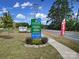 Poplin Glen Townhomes sign offering 3 bedroom townhomes from the $300s at 149 Briana Marie Way, Indian Trail, NC 28079