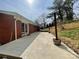Spacious backyard featuring a concrete patio and a well-maintained lawn at 1525 16Th Avenue Nw Cir, Hickory, NC 28601