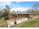 Spacious backyard featuring a concrete patio and a well-maintained lawn at 1525 16Th Avenue Nw Cir, Hickory, NC 28601