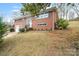 Charming two-story brick home with a well-manicured lawn and updated windows at 1525 16Th Avenue Nw Cir, Hickory, NC 28601