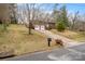 Charming two-story brick home with a long driveway and attached two-car garage at 1525 16Th Avenue Nw Cir, Hickory, NC 28601