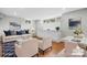 Brightly lit living room and dining area with modern decor and hardwood floors at 1525 16Th Avenue Nw Cir, Hickory, NC 28601