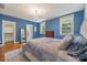 Bedroom with hardwood floors, natural light, and neutral paint that create a relaxing retreat at 1620 Arnold Dr, Charlotte, NC 28205