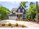 Charming two-story home with manicured landscaping and a two-car garage at 1620 Arnold Dr, Charlotte, NC 28205