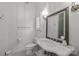 Elegant bathroom features marble vanity, stylish mirror, and classic fixtures for a sophisticated retreat at 1625 Bibury Ln, Charlotte, NC 28211