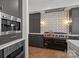Gourmet kitchen featuring stainless steel appliances and custom cabinetry at 1625 Bibury Ln, Charlotte, NC 28211