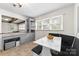 An eat-in dining area with built in seating and cabinetry near the renovated kitchen at 16453 Nc Hwy 73 Hwy, Albemarle, NC 28001