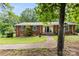 Charming brick home with a well-maintained lawn and inviting front entrance at 16453 Nc Hwy 73 Hwy, Albemarle, NC 28001