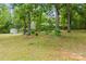 Secluded home on lush property with shade trees and a separate outbuilding offering endless possibilities at 16453 Nc Hwy 73 Hwy, Albemarle, NC 28001