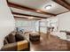 Inviting living room with hardwood floors and exposed beam ceiling at 16453 Nc Hwy 73 Hwy, Albemarle, NC 28001