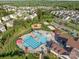 Stunning aerial view of the community amenities, including the pool and clubhouse at 1725 Mill Creek Sw Ln, Concord, NC 28025