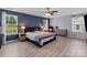 Spacious bedroom boasting natural light, hard wood floors and tasteful decor at 1725 Mill Creek Sw Ln, Concord, NC 28025