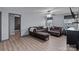 Relaxing living room boasting neutral walls, wood floors, and comfortable furnishings at 1725 Mill Creek Sw Ln, Concord, NC 28025
