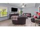 Comfortable living room with ample seating, natural light, and stylish decor, perfect for relaxation at 1725 Mill Creek Sw Ln, Concord, NC 28025