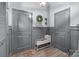 This functional mudroom with custom storage, a bench, and stylish decor offers an organized and welcoming transition space at 1725 Mill Creek Sw Ln, Concord, NC 28025