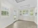 Bonus room with tile floors and a light filled interior at 17835 Terryglass Ln, Charlotte, NC 28278
