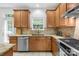 Beautiful kitchen with stainless steel appliances, granite countertops, and wood cabinets at 200 Winter Flake Dr, Statesville, NC 28677