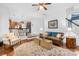 Cozy living room with hardwood floors, an area rug, and direct access to the adjacent kitchen area at 200 Winter Flake Dr, Statesville, NC 28677