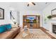 Comfortable living room with a media center, fireplace, hardwood floors, and plenty of seating at 200 Winter Flake Dr, Statesville, NC 28677