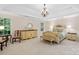 Spacious main bedroom features a tray ceiling, neutral colors and en-suite bathroom at 200 Winter Flake Dr, Statesville, NC 28677