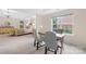 Spacious main bedroom features tray ceilings, a cozy sitting area, and lots of natural light at 200 Winter Flake Dr, Statesville, NC 28677