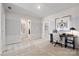Bright home office with a desk, carpet, and neutral color palette at 2023 Puddle Pond Rd, Indian Trail, NC 28079