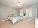 Bright bedroom featuring two windows, paint, and carpet at 2406 Tarleton Twins Ter, Charlotte, NC 28270