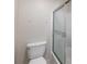 Bathroom features white toilet and glass shower door at 302 Northwest Dr, Davidson, NC 28036