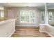 Open floor plan featuring hardwood floors and lots of windows for natural light at 302 Northwest Dr, Davidson, NC 28036