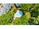 Aerial view of a community pool nestled among lush trees, offering a refreshing retreat at 302 Northwest Dr, Davidson, NC 28036