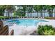 Inviting community pool surrounded by lounge chairs, perfect for relaxing and enjoying the outdoors at 302 Northwest Dr, Davidson, NC 28036