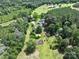 Expansive wooded property features a home, sheds, and the tranquility of nature at 4636 Brown Creek Church Rd, Wadesboro, NC 28170