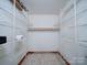 Walk-in closet with multiple shelves at 4636 Brown Creek Church Rd, Wadesboro, NC 28170