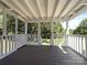Outdoor deck space with white railings, offering views of the surrounding yard at 4636 Brown Creek Church Rd, Wadesboro, NC 28170