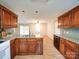Inviting kitchen showing the wood cabinets and an open layout to the rest of the home at 4636 Brown Creek Church Rd, Wadesboro, NC 28170