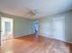 Large main bedroom featuring wood-look floors and adjoining bathroom at 4636 Brown Creek Church Rd, Wadesboro, NC 28170