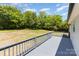 Back deck overlooking a large grass filled backyard at 4750 Enochville Rd, Kannapolis, NC 28081