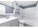 The bathroom has a vanity, toilet and tub with shower at 4750 Enochville Rd, Kannapolis, NC 28081