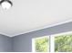 Bedroom with trim, natural light, neutral colors, and simple lighting fixture at 4750 Enochville Rd, Kannapolis, NC 28081