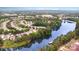 Scenic aerial view of a residential community nestled by a tranquil lake and green trees at 5141 Grandview Dr, Fort Mill, SC 29707