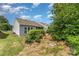 Backyard showcasing a well-maintained exterior, patio, and lush landscaping for outdoor enjoyment at 5141 Grandview Dr, Fort Mill, SC 29707