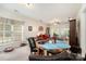 Comfortable dining area with a marble-top table adjacent to a bright living space at 5141 Grandview Dr, Fort Mill, SC 29707
