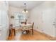 Bright dining room with hardwood floors and natural light from the large window at 5141 Grandview Dr, Fort Mill, SC 29707
