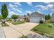Street view of homes with well-manicured lawns, driveways, and inviting curb appeal at 5141 Grandview Dr, Fort Mill, SC 29707