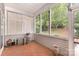 Bright sunroom with tile floors and multiple windows offering natural light and views at 5141 Grandview Dr, Fort Mill, SC 29707