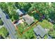 An aerial view highlights the well-manicured landscaping and mature trees surrounding the home at 532 Scaleybark Rd, Charlotte, NC 28209