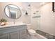 Modern bathroom with a glass-enclosed shower, sleek vanity, and elegant fixtures at 532 Scaleybark Rd, Charlotte, NC 28209
